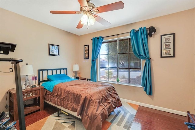 3920 Autumn St, Las Vegas, NV 89120 - bedroom with wood finished floors, baseboards, and ceiling fan