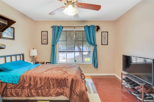 3920 Autumn St, Las Vegas, NV 89120 - bedroom featuring wood finished floors, baseboards, and a ceiling fan