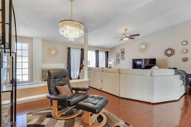3920 Autumn St, Las Vegas, NV 89120 - living area featuring plenty of natural light, wood finished floors, a ceiling fan, baseboards, and vaulted ceiling