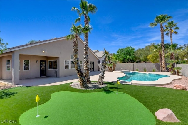 view of pool with a fenced in pool, a fenced backyard, and a patio area