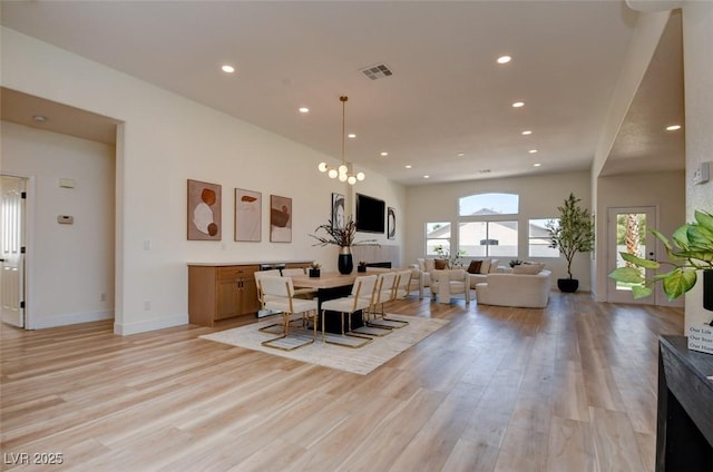 dining area with recessed lighting, visible vents, baseboards, and light wood-type flooring