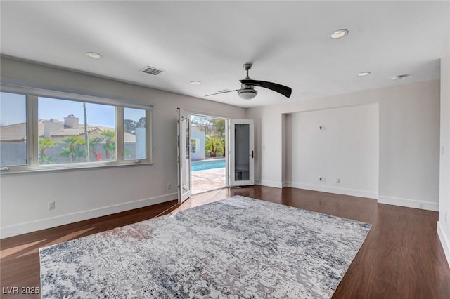 7575 Coley Ave, Las Vegas, NV 89117 - unfurnished room featuring ceiling fan, recessed lighting, and dark wood-style flooring
