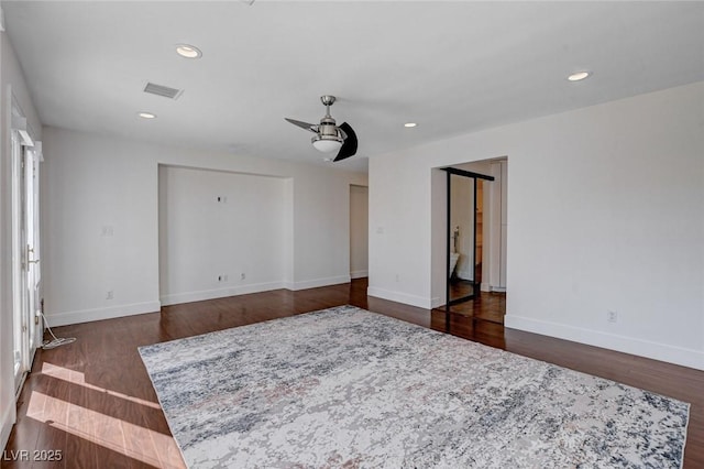 7575 Coley Ave, Las Vegas, NV 89117 - empty room featuring a ceiling fan, recessed lighting, and dark wood finished floors