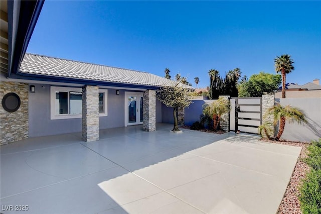 7575 Coley Ave, Las Vegas, NV 89117 - view of patio featuring a gate