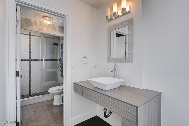 7575 Coley Ave, Las Vegas, NV 89117 - full bathroom featuring a chandelier and a stall shower