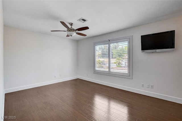 7575 Coley Ave, Las Vegas, NV 89117 - empty room with ceiling fan and dark wood finished floors