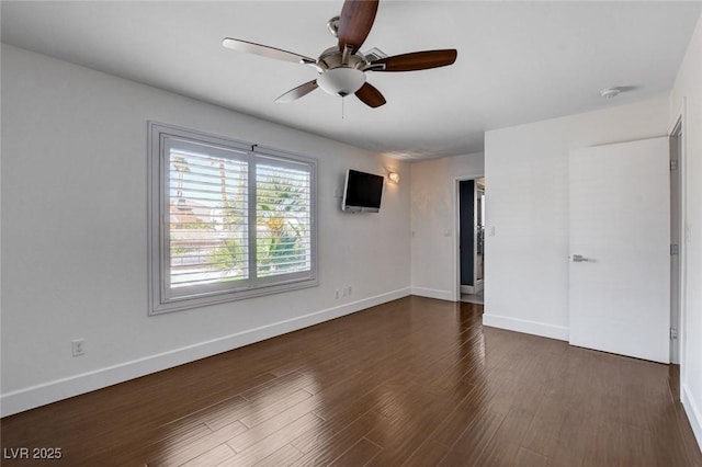 7575 Coley Ave, Las Vegas, NV 89117 - unfurnished room featuring ceiling fan and dark wood-type flooring
