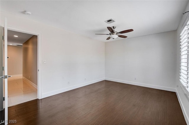 7575 Coley Ave, Las Vegas, NV 89117 - unfurnished room with a ceiling fan, dark wood-type flooring, and a smoke detector