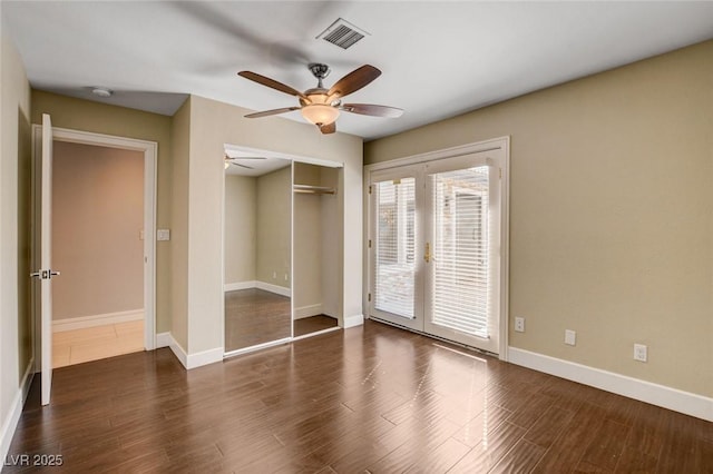7575 Coley Ave, Las Vegas, NV 89117 - unfurnished bedroom featuring access to outside, wood finished floors, a closet, a ceiling fan, and french doors