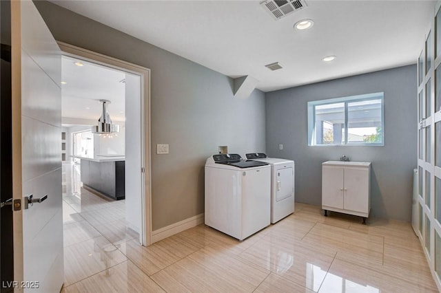 7575 Coley Ave, Las Vegas, NV 89117 - laundry area featuring washer and clothes dryer and recessed lighting