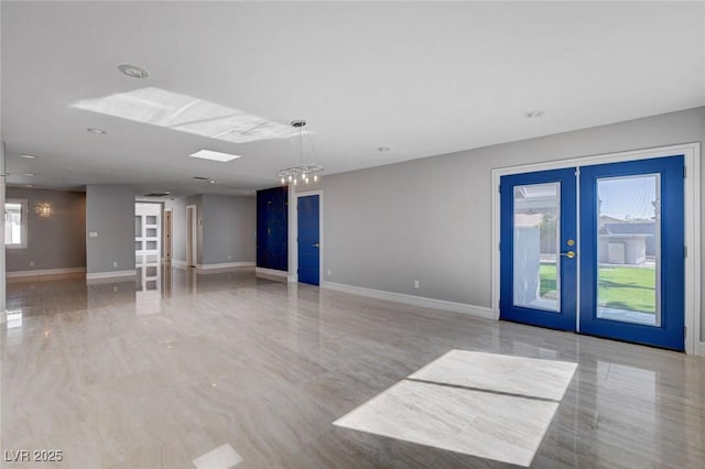 7575 Coley Ave, Las Vegas, NV 89117 - empty room with french doors and baseboards