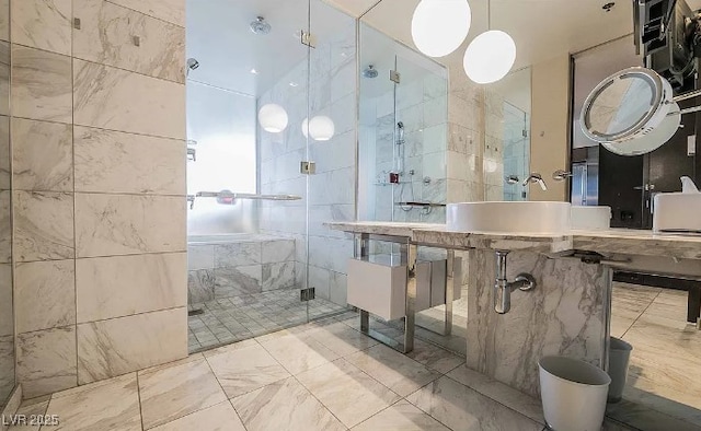 4381 W Flamingo Rd Unit 1212, Las Vegas, NV 89103 - full bath featuring marble finish floor, tile walls, and a shower stall