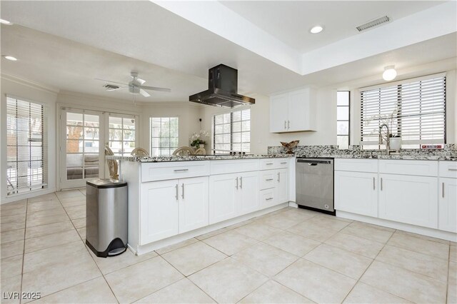 2255 S Buffalo Dr, Las Vegas, NV 89117 - kitchen featuring stainless steel dishwasher, exhaust hood, light stone counters, ceiling fan, and a peninsula