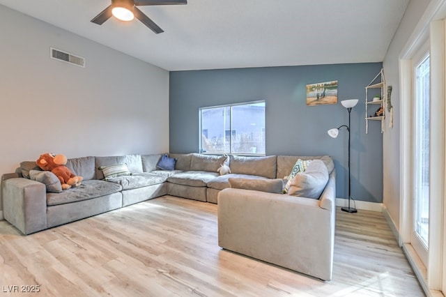 2129 N Michael Way, Las Vegas, NV 89108 - living room with plenty of natural light, ceiling fan, and light wood finished floors