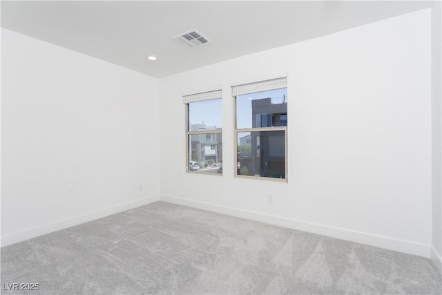 8125 Monsoon Bay St, Las Vegas, NV 89113 - unfurnished room featuring baseboards, visible vents, carpet flooring, and recessed lighting