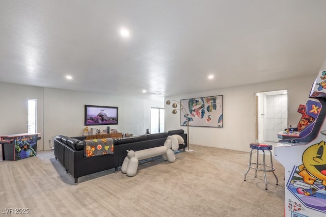 living room featuring recessed lighting and carpet floors