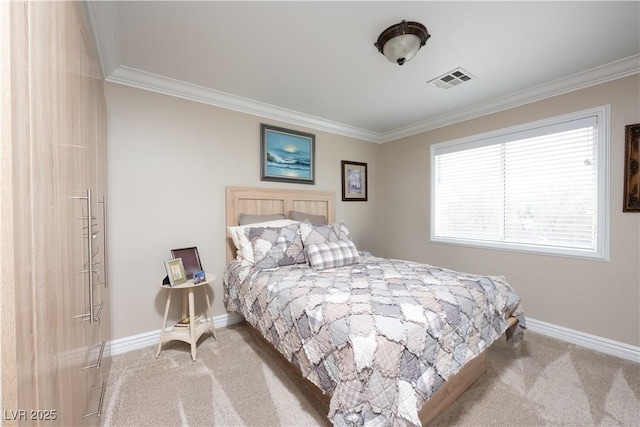 carpeted bedroom with visible vents, crown molding, and baseboards