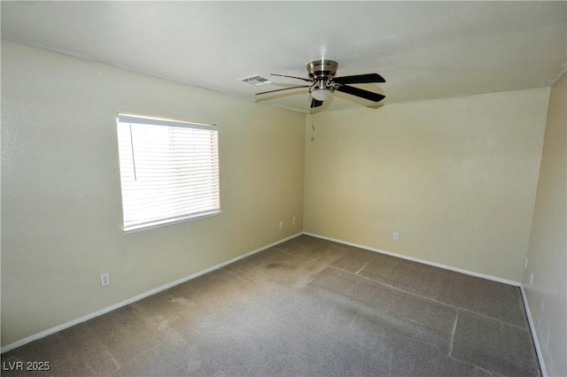 unfurnished room with baseboards, visible vents, ceiling fan, and carpet