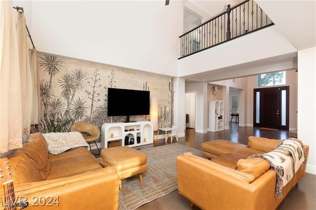 living room with baseboards and wood finished floors