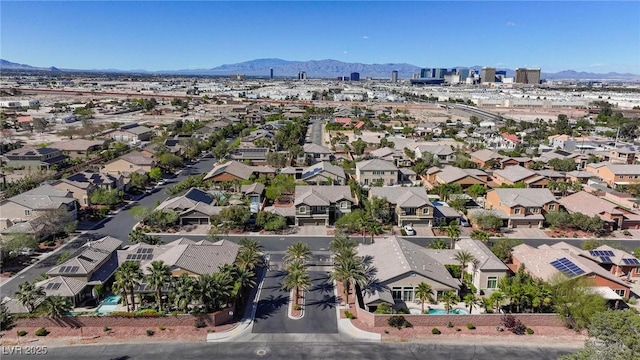 aerial perspective of suburban area with a mountainous background