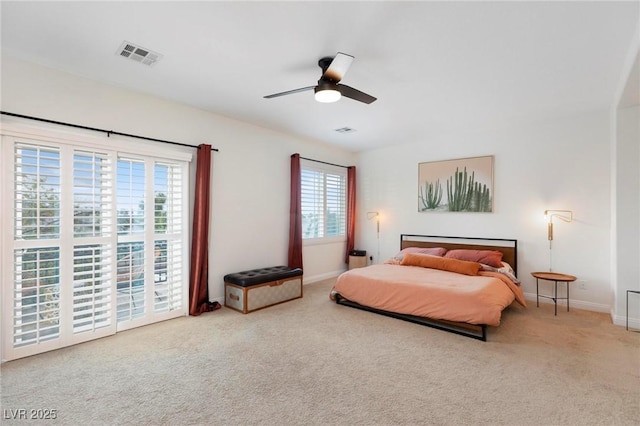 bedroom featuring carpet, baseboards, and access to exterior