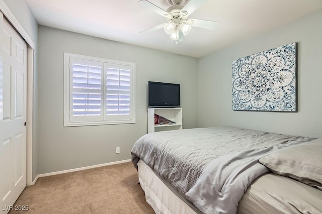 13 Cozy Glen Cir, Henderson, NV 89074 - bedroom with a ceiling fan, baseboards, carpet, and a closet