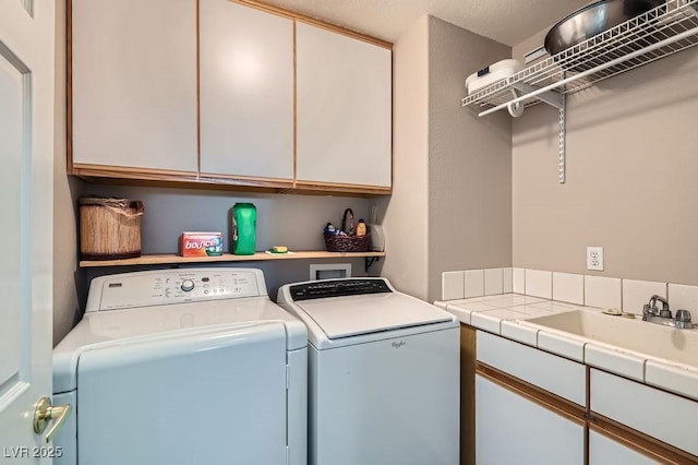 13 Cozy Glen Cir, Henderson, NV 89074 - laundry area with a sink, cabinet space, and washer and dryer