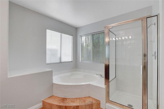 8236 Bermuda Beach Dr, Las Vegas, NV 89128 - full bathroom with a garden tub, a shower stall, and tile patterned flooring