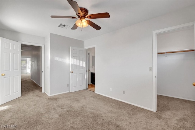 8236 Bermuda Beach Dr, Las Vegas, NV 89128 - unfurnished bedroom with carpet flooring, baseboards, visible vents, and a spacious closet