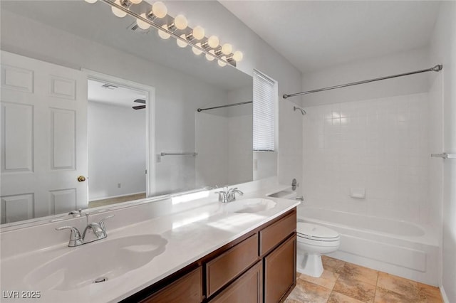 8236 Bermuda Beach Dr, Las Vegas, NV 89128 - bathroom featuring double vanity, toilet, a sink, and bathtub / shower combination