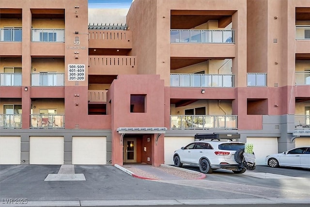 59 E Agate Ave Unit 406, Las Vegas, NV 89123 - view of property featuring an attached garage