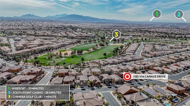 1125 Via Canale Dr, Henderson, NV 89011 - birds eye view of property featuring a mountain view, a residential view, and view of golf course