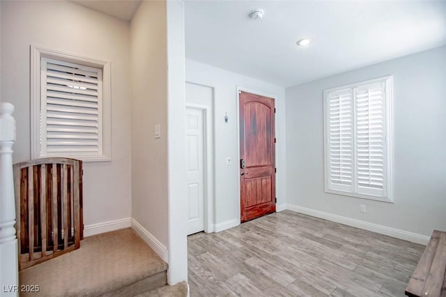 1125 Via Canale Dr, Henderson, NV 89011 - foyer featuring recessed lighting, wood finished floors, and baseboards