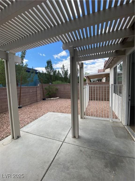 view of patio / terrace featuring a pergola and a fenced backyard