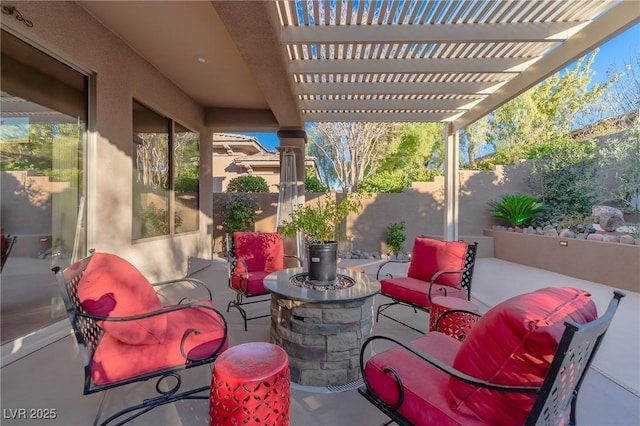 view of patio / terrace featuring fence, a pergola, and outdoor lounge area