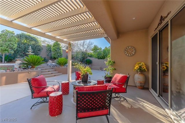 view of patio / terrace with fence and a pergola