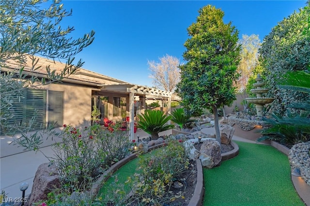 view of yard with a pergola