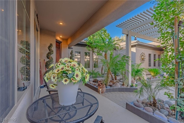 view of patio featuring a pergola