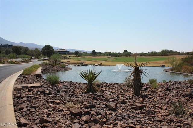 water view featuring a mountain view and view of golf course