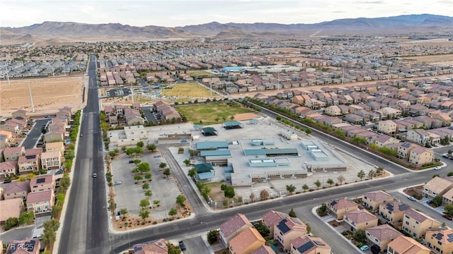 aerial view with a mountain view and a residential view