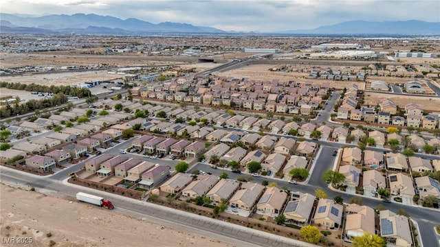 bird's eye view featuring a residential view and a mountain view