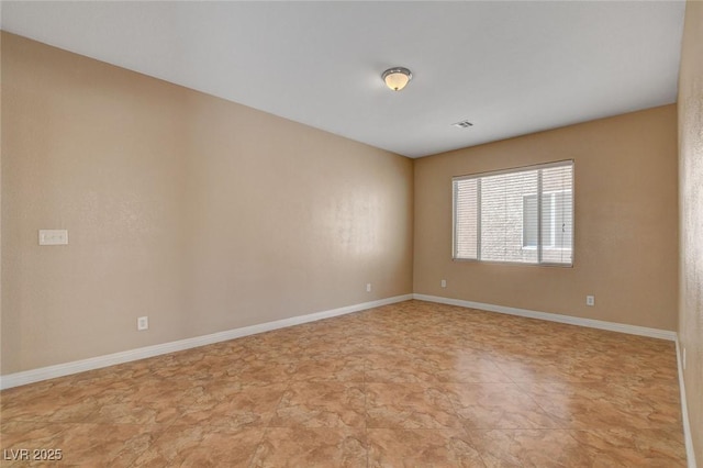 8988 Winchester Ridge St, Las Vegas, NV 89139 - spare room with baseboards