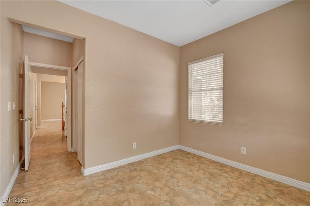 8988 Winchester Ridge St, Las Vegas, NV 89139 - empty room featuring baseboards