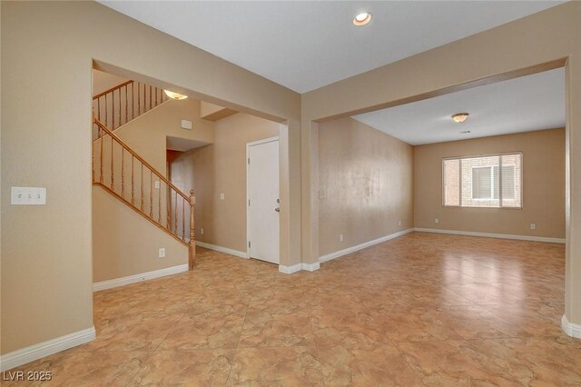 8988 Winchester Ridge St, Las Vegas, NV 89139 - unfurnished room with stairs and baseboards