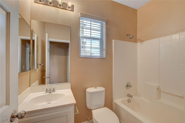 8988 Winchester Ridge St, Las Vegas, NV 89139 - full bathroom with toilet, a textured wall, tub / shower combination, and vanity