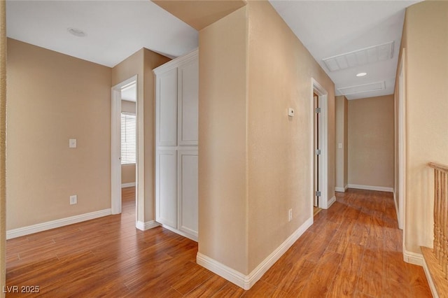 8988 Winchester Ridge St, Las Vegas, NV 89139 - hall featuring visible vents, baseboards, and light wood-style floors
