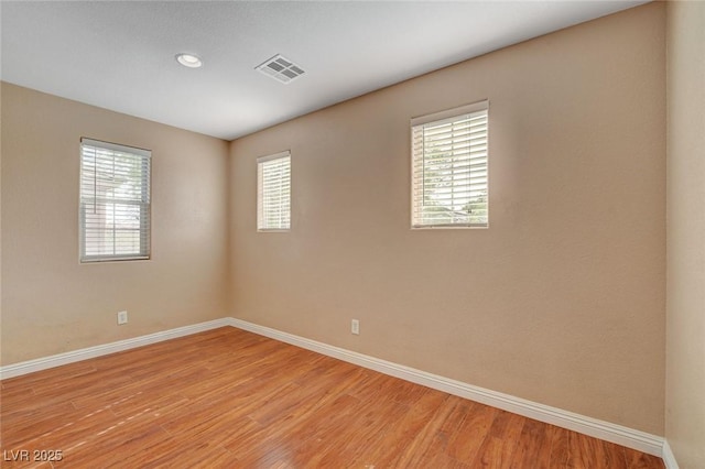 8988 Winchester Ridge St, Las Vegas, NV 89139 - spare room featuring visible vents, recessed lighting, light wood finished floors, and baseboards