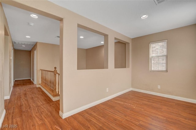 8988 Winchester Ridge St, Las Vegas, NV 89139 - empty room with recessed lighting, wood finished floors, and baseboards