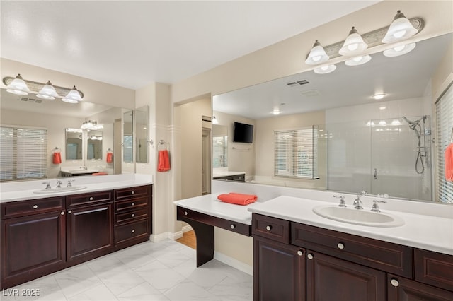 1265 Vietti St, Henderson, NV 89012 - bathroom featuring a shower stall and two vanities
