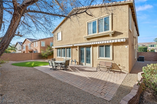 1265 Vietti St, Henderson, NV 89012 - back of property with stucco siding, a fenced backyard, and a patio area